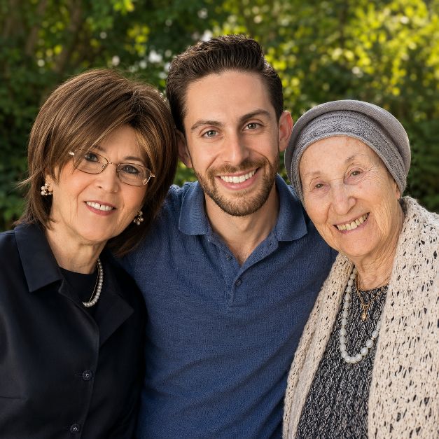 Moshe, founder of RightKind Care, with his two grandmothers